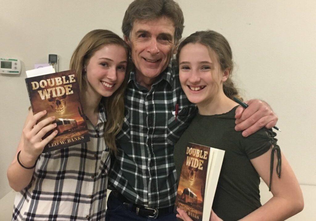 Leo with his nieces at a book signing